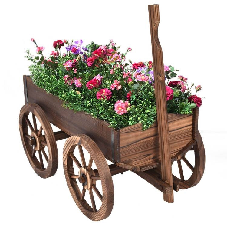 Rustic wooden barrel wagon planter for a garden or patio