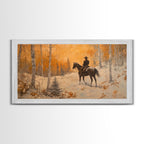 Cowboy riding horse through deep snow in a winter storm, Framed Canvas Print, dynamic winter wall art, rustic western home decor