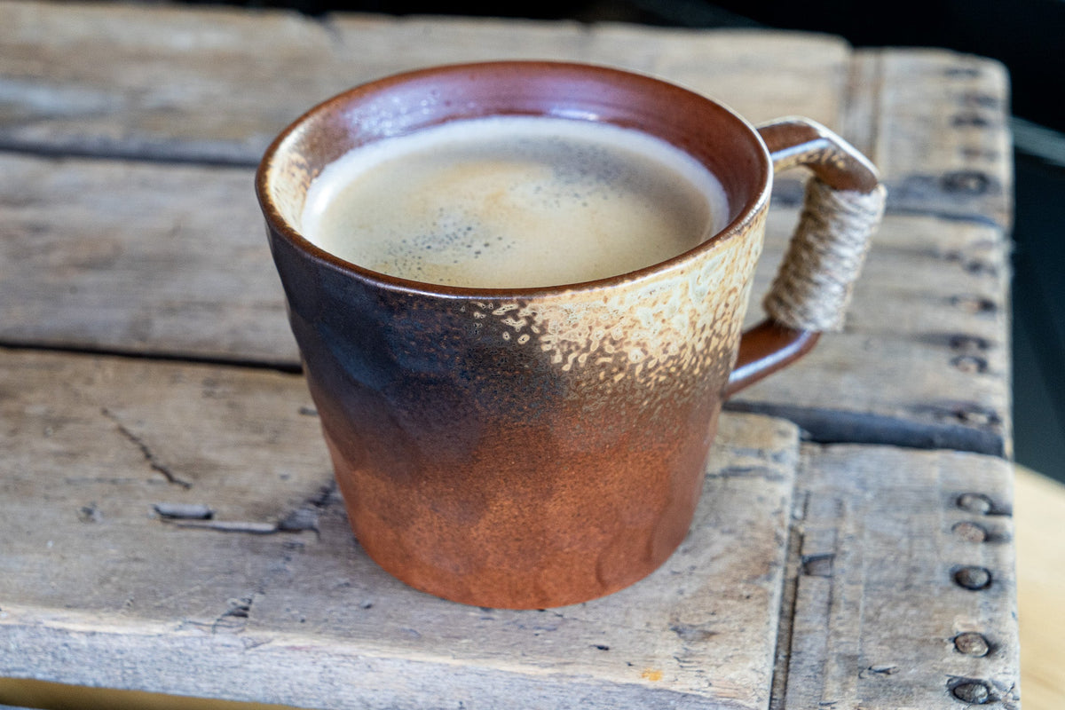Rustic Handmade Ceramic Coffee Mug – Textured Stoneware with Earthy Glaze & Wrapped Handle