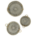 Set of three extra-large round willow serving trays shown on a white background