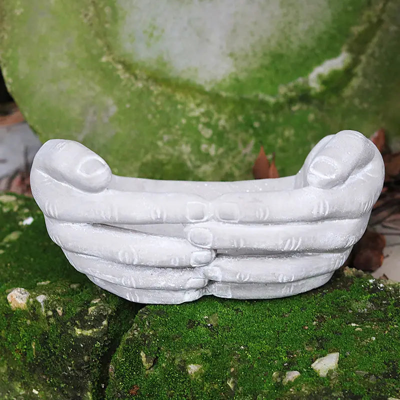 Hand-Shaped Concrete Planters