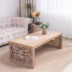 Rustic Carved Wood Coffee Table, Handcrafted Look With Ornate Side Panels